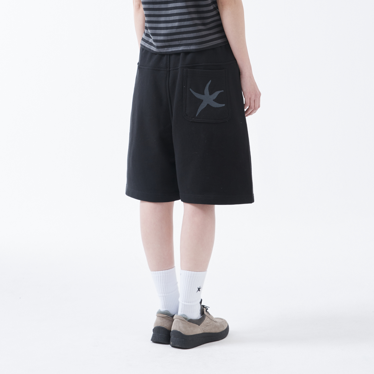 TCM back logo half sweat pants (black)